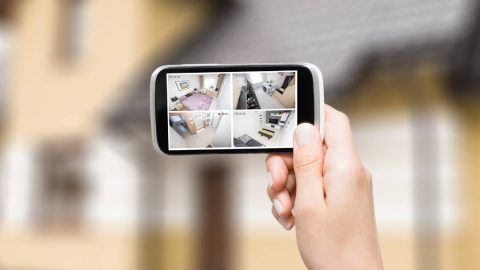 Smartphone displaying a phone monitoring app interface, symbolizing digital surveillance and security."
