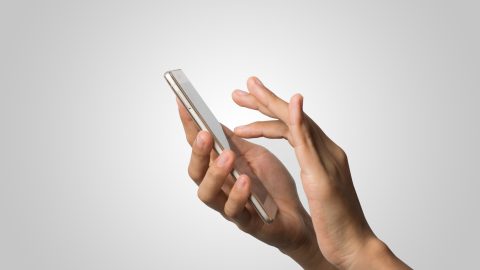 Smartphone displaying a phone monitoring app interface, symbolizing digital surveillance and security."