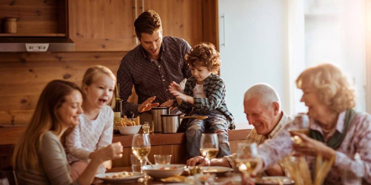 A complete family, consisting of a father, mother, and children, and grandparents