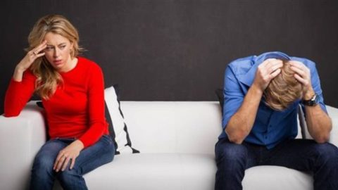 A distressed couple experiencing tension, symbolic of the turmoil caused by an affair
