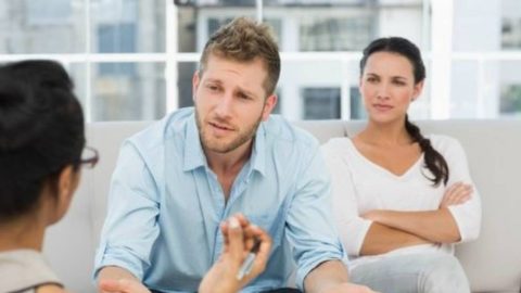 Couple in therapy discussing how to treat a cheating husband.