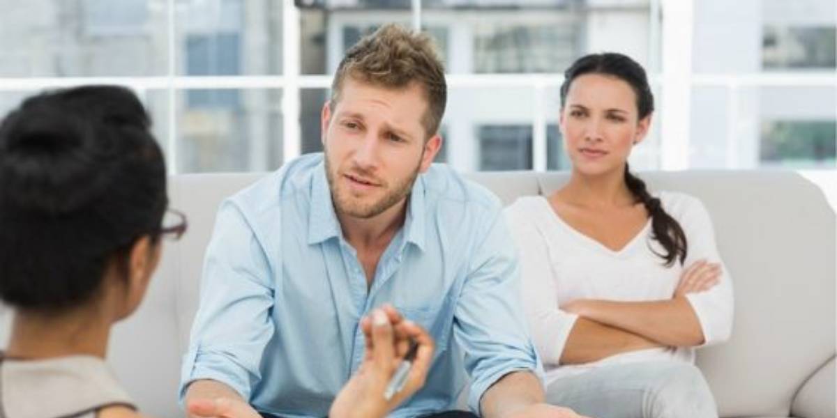 Couple in therapy discussing how to treat a cheating husband.