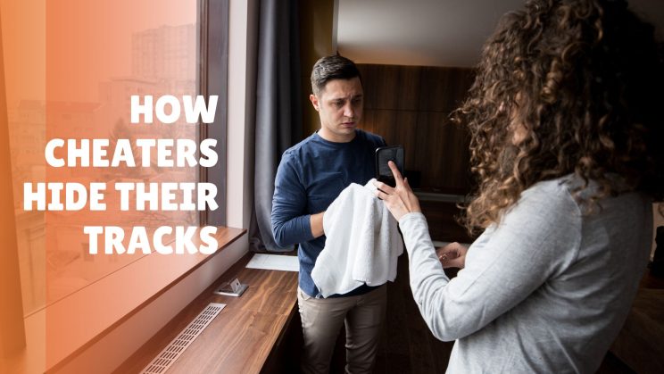 Man holding a handkerchief while a woman shows something on her phone.